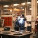A welder working on metal components in an industrial factory in Konya, Türkiye.
